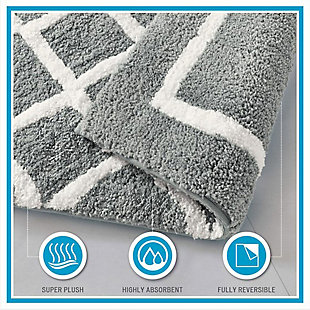 The Madison Park Bittman bath rug gives your bathroom a modern update. Fully reversible, this high pile bath rug features a geometric fretwork design that flips to a classic border pattern for two soft contemporary looks. Easy to coordinate with your bathroom decor, this rug is machine washable for easy care.Made of microfiber | Reversible design | Oeko-Tex Certified, includes no harmful substances or chemicals | No backing; rug pad recommended | Machine washable | Imported