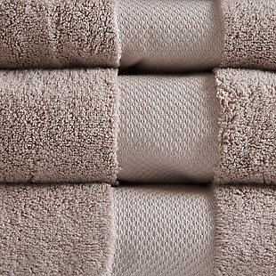 Elevate your bathroom decor with the Madison Park Signature 6-piece towel set. This luxurious set is made from highly absorbent 100% premium Turkish cotton for an incredibly soft and plush look and feel. Thick, generously sized and machine washable for easy care, these towels transform your bathroom into a relaxing, spa-like retreat.Includes 2 bath towels, 2 hand towels and 2 washcloths | Made of 100% Turkish cotton | Over 600gsm weight | Oeko-Tex Certified, includes no harmful substances or chemicals | Machine washable | Imported