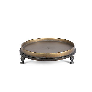 You'll add a touch of simple elegance to your home with this charming set of two decorative footed trays. Each of these delightful trays has a burnished goldtone finish. Arranged separately or together, they're the perfect housewarming gift for that special someone, or can be used to enhance and accentuate your personal decor.Set of 2 | Made of iron with goldtone finish | Stack trays and decorate with faux greenery, LED candles and stones or river rocks (not included) | Raised edges | 3 beautiful ornate legs on each tray