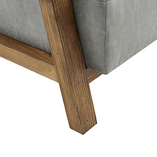 Add a sophisticated update to your living room with the INK+IVY Easton Accent Chair. Upholstered in gray faux leather, the chair features a reclaimed oak wood finish for a contemporary look. Sit in luxurious comfort and bring an elevated touch to your home decor.Made with wood | Reclaimed oak finish | Polyester upholstery | Foam and silk wadding fill | Assembly required