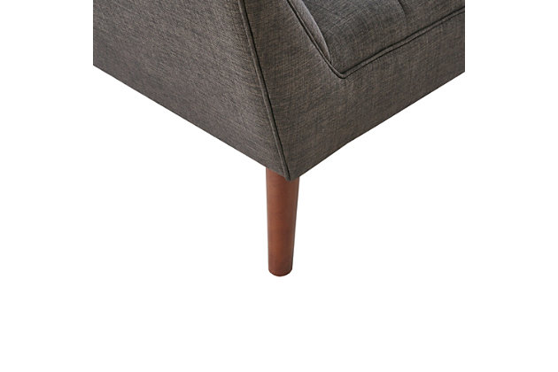 Accent your living area with a splash of color from INK+IVY’s Newport Lounge Chair. The tight back and seat feature a clean, tailored look accented with tufted buttons. Textured charcoal upholstery and a pecan finish on the wood legs give this lounge chair a warm and alluring appeal. With its mid-century design and small silhouette, it's sure to impress in your living room.Made with wood | Legs with pecan finish | Polyester upholstery | High-density foam filling | Button tufting | Attached seat cushion | Assembly required