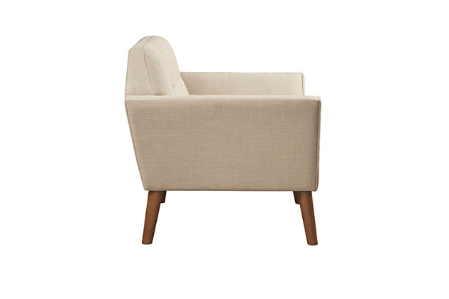 Accent your living area with a splash of color from INK+IVY’s Newport Lounge Chair. The tight back and seat feature a clean, tailored look accented with tufted buttons. Textured beige upholstery and a pecan finish on the wood legs give this lounge chair a warm and alluring appeal. With its mid-century design and small silhouette, it's sure to impress in your living room.Made with wood | Legs with pecan finish | Polyester upholstery | High-density foam filling | Button tufting | Attached seat cushion | Assembly required