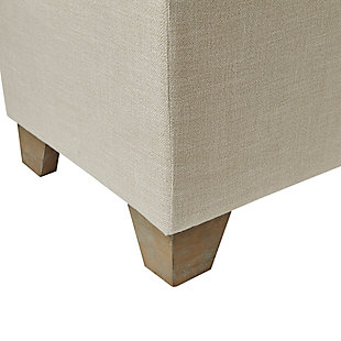 Bring style and functionality to your home with the Madison Park Ashcroft Storage Bench. Upholstered in a natural-hued fabric, it features a split button-tufted top that lifts to reveal an ample space for your blankets. The solid wood legs complement the upholstery with a natural finish. Simple and versatile, this upholstered storage bench pairs easily with most home decor.Made with wood | Polyester upholstery | Foam filling | Button tufting | Top split in half | Storage space under lift top