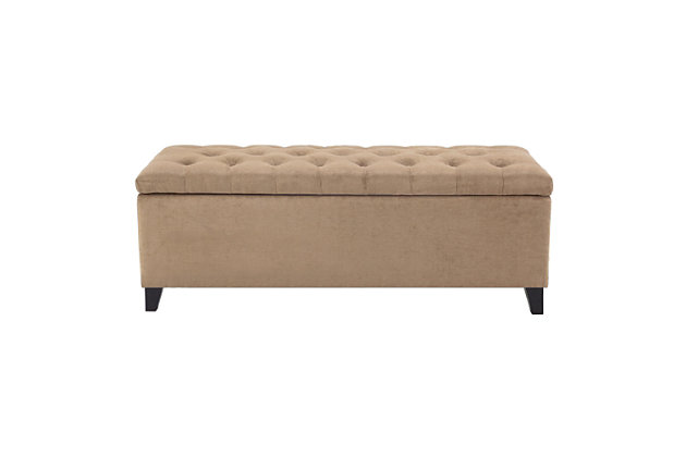 The modern Shandra Storage Bench organizes linens and impresses with its stylish details. Featuring an elegant sand-hued fabric with espresso-colored legs, it provides the perfect functional finishing touch for your space.Made with wood | Legs with espresso-hued finish | Polyester upholstery | High-density foam filling | Button-tufted detailing | Interior storage