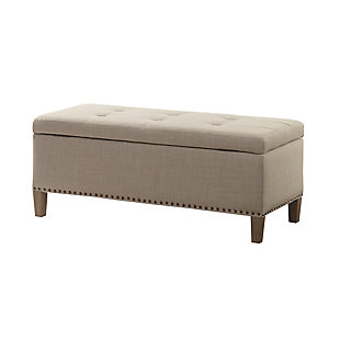 The modern Shandra II Storage Bench organizes linens and impresses with its stylish details. Featuring an elegant taupe linen fabric with reclaimed natural legs, it provides the perfect functional finishing touch for your space. Made with wood | Polyester upholstery | High-density foam filling | Button-tufted detailing | Interior storage