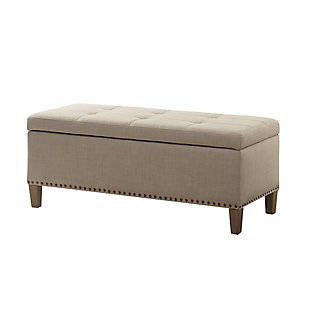 The modern Shandra II Storage Bench organizes linens and impresses with its stylish details. Featuring an elegant taupe linen fabric with reclaimed natural legs, it provides the perfect functional finishing touch for your space. Made with wood | Polyester upholstery | High-density foam filling | Button-tufted detailing | Interior storage