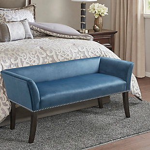 Accent your home with the simple elegance of the Madison Park Welburn Accent Bench. Upholstered in a blue fabric, it features a low back and flared arms that create a sleek and sophisticated look. Bronze-tone nailhead trim adds elegance, while the wood finish complements its upholstery. Perfect for your bedroom or living room, this upholstered bench provides a chic update to your home decor. Made with wood | Legs with dark coffee-colored finish | Polyester upholstery | Foam filling | Bronze-tone nailhead trim