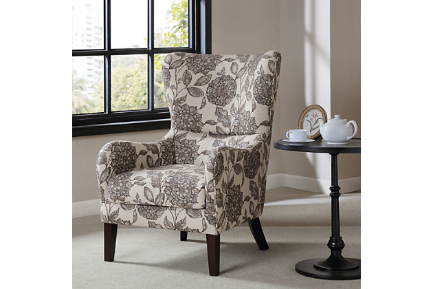 The Madison Park Arianna Swoop Wing Chair offers a unique style and comfort to elevate your home decor. This chic transitional accent chair features a high wing-style back and a comfortable loose seat. Rounded arms help highlight the charming silhouette, while piping details around the edge add dimension. Simple and clean in design, this chair provides a fashionable update to your living room decor. Made with wood | Legs with espresso-hued finish | Polyester upholstery | High-density foam filling | Loose seat cushion | Wingback | Round arm | Piping around edge  | Assembly required