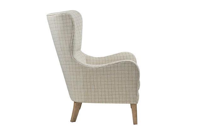 The Madison Park Arianna Swoop Wing Chair offers a unique style and comfort to elevate your home decor. This chic transitional accent chair features a high wing-style back and a comfortable loose seat. Rounded arms help highlight the charming silhouette, while piping details around the edge add dimension. Simple and clean in design, this chair provides a fashionable update to your living room decor. Made with wood | Legs with reclaimed biscuit finish | Polyester upholstery | Foam filling | Loose seat cushion | Wingback | Round arm | Piping around edge  | Assembly required