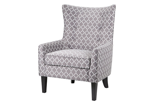 The Carissa Shelter Wing Chair's reinterpretation of the wingback is a refined new classic. Sheltering wings create narrow arms with subtle tufting accents, while the gray fretwork upholstery gives this chair added appeal.Made with wood | Legs with black finish | Polyester upholstery | High-density foam filling | Tight back, loose seat | Button tufting | Assembly required