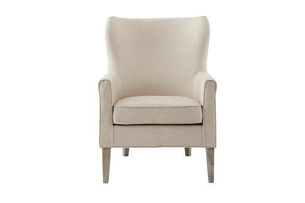 Make a statement in your living room with the Madison Park Colette Accent Chair. The high back and track arms of this stylish accent chair create an elegant silhouette, while the natural-hued upholstery pairs easily with existing decor. Brass-tone nailhead trim and a reclaimed wood finish on the legs beautifully complement the transitional look.Made with wood | Legs with reclaimed natural finish | Polyester upholstery | High-density foam filling | Brass-tone nailhead trim | High-back construction | Weight capacity 300 lbs. | Assembly required