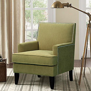 The track arm Colton Club Chair is sure to impress with its sleek contemporary lines, exposed wood legs and nailhead trim. It provides a charming new spin on the classic living room, making it a must-have for modern homemakers.Made with wood | Legs with merlot-hued finish | Polyester upholstery | High-density foam filling | Silvertone nailhead trim | Tight back, loose seat | Assembly required