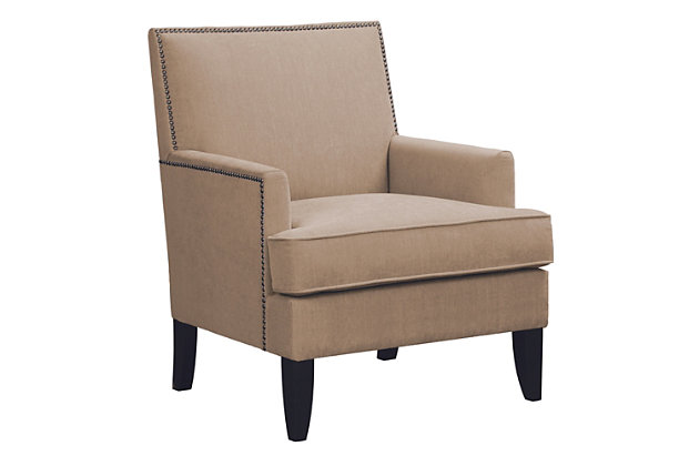 The track arm Colton Club Chair is sure to impress with its sleek contemporary lines, exposed wood legs and nailhead trim. It provides a charming new spin on the classic living room, making it a must-have for modern homemakers.Made with wood | Legs with merlot-hued finish | Polyester upholstery | High-density foam filling | Bronze-tone nailhead trim | Tight back, loose seat | Assembly required