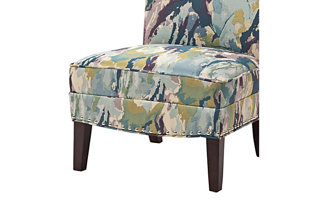 The Hayden Slipper Accent Chair is the perfect marriage of convenience and comfort. With its gracefully shaped back and armless styling, combined with an on-trend watercolor print, it will be a stunning accent piece in your room.Made with wood | Legs with espresso-hued finish | Polyester upholstery | High-density foam filling | Silvertone nailhead trim | Tight back, attached seat | Assembly required