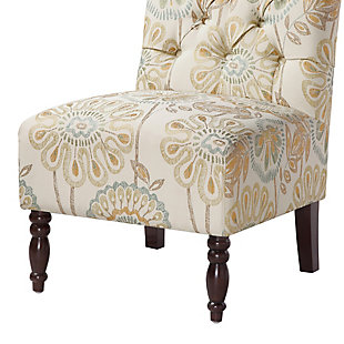 The Lola Tufted Armless Chair has a delightfully cozy vintage appeal. Classic button tufting, an armless design and turned legs marry to create this timelessly chic look.Made with wood | Legs with espresso-hued finish | Polyester upholstery | High-density foam filling | Hand-carved spooled legs | Button tufting | Assembly required