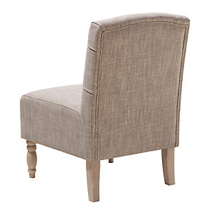 The Lola Tufted Armless Chair has a delightfully cozy vintage appeal. Classic button tufting, an armless design and turned legs marry to create this timelessly chic look.Made with wood | Legs with reclaimed natural finish | Polyester upholstery | High-density foam filling | Hand-carved spooled legs | Button tufting | Assembly required