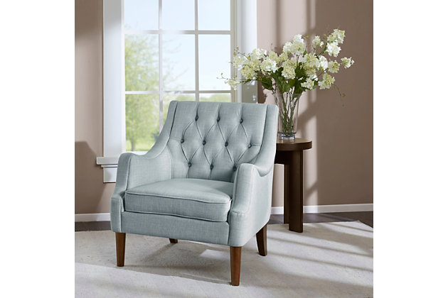 The vintage-inspired Qwen Accent Chair is the epitome of beauty and grace. It showcases sweeping serpentine arms and a soft, diamond-tufted back resting elegantly on tapered posts. With this chair, it's easy to curate a cozy antique retreat.Made with wood | Legs with dark coffee-colored finish | Polyester upholstery | Foam filling | Loose seat cushion | Button tufting | Assembly required