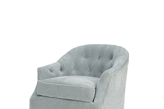 Classic meets contemporary with the Madison Park Calvin Swivel Chair. The curved, wide back features button tufts that add charm and elegance to the design. Upholstered in a soft light blue velvet fabric, the chair's swivel feature makes it easy for you to find the best position for socializing or watching TV.Made with wood | Metal base with black finish | Polyester upholstery | High-density foam filling | Swivel feature | Button tufting