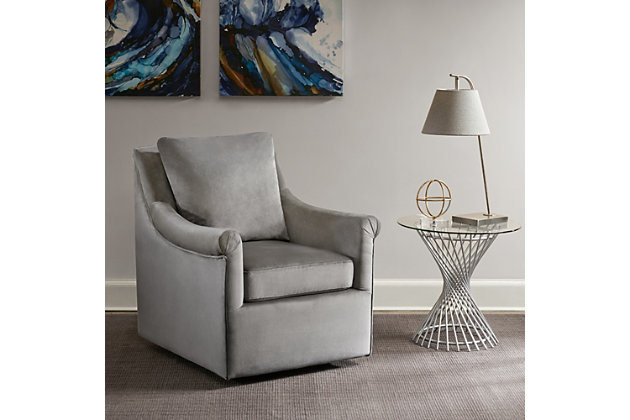 With its curved arms and straight back, the Madison Park Deanna Swivel Chair adds a touch of glamour to any space. A swivel feature allows it to smoothly rotate on its base. Upholstered in gray fabric, this lounge chair will be an eye-catching addition to your home.Made with wood | Metal base with black finish | Polyester upholstery | Foam filling | Swivel feature