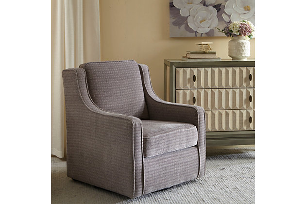 The Madison Park Harris Swivel Chair perfectly brings classic and contemporary together. Curved arms create a subtly stylish wingback look, while the soft gray upholstery is sure to please. What's more, the swivel feature allows the lounge chair to rotate on its black metal base for ultimate versatility.Made with wood | Metal base with black finish | Polyester upholstery | High-density foam filling | Swivel feature