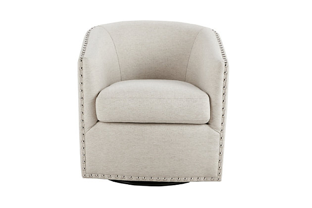 Relax in style with the Madison Park Tyler Swivel Chair. Its curved design and high-density foam cushion create a deep and comfortable seat, allowing for instant relaxation. Silvertone nailheads lining the arms and back add charm and style, while the swivel feature allows for easy mobility. Upholstered in a natural-colored fabric, this swivel chair fits in any room of your home.Made with wood | Metal base with black finish | Polyester upholstery | High-density foam filling | Silvertone nailhead trim | 360-degree swivel