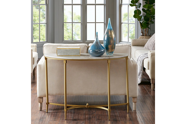 The Madison Park Signature Bordeaux Console Table transforms your living room with its sophisticated traditional style. Flaunting a high-class look, it showcases a white marble tabletop with beautifully coordinating goldtone metal legs. Slip this elegant table into your living room or entryway to bring a glamorous allure to your decor.Made of marble and wood | Metal legs with goldtone finish | Assembly required