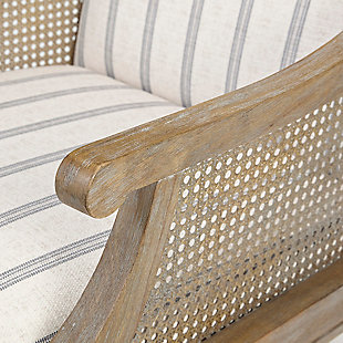 Complete your living room decor with the unique and charming Isla Accent Chair. Embodying country farmhouse living, it features an upholstered seat and backrest with synthetic cane inset arms. The frame and legs showcase a reclaimed natural finish to complement the upholstery. Made with wood | Legs with reclaimed natural finish | Synthetic cane webbing arms | Polyester upholstery | Foam filling | Assembly required
