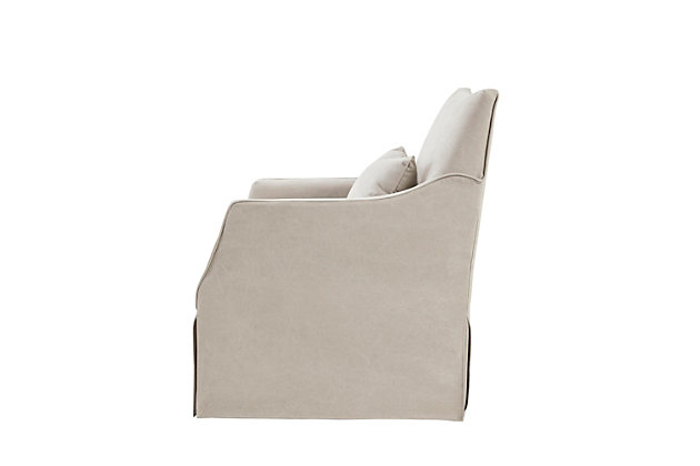 The Martha Stewart London Swivel Chair introduces simple coziness to your living room decor. Upholstered in soft beige fabric with a removable seat cushion, it provides exceptional comfort. The swivel base allows the chair to fully rotate 360 degrees, while the skirted bottom helps conceal it for a transitional look. Made with wood | Metal base with black finish | Polyester/cotton upholstery  | Foam filling | Loose seat cushion | Lumbar pillow included | Assembly required