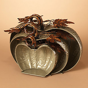 The perfect Thanksgiving season accessory, this nested trio of hammered metal pumpkins add a festive look anyone will be thankful for! Metal’s hammered effect infuses rich texture and a realistic sensibility. Bronze-tone accents enhance the aesthetic beautifully.Set of 3 | Made of metal | Hammered silvertone finish