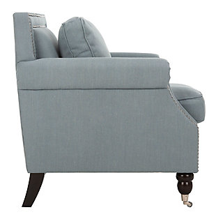 Timeless, elegant and perfect for a casual lifestyle, the classic Karsen club chair by Safavieh is upholstered in a linen and cotton blend in seaside blue with rolled arms, plump seat and back cushions and beautifully turned birch legs finished in espresso.  Silvertone nailhead detailing and front casters add to this chair’s easy-going transitional style.Made with birch wood, stainless steel, polyester/cotton/linen fabric and soft polyfill | Blue upholstery | Espresso finish on legs | Silvertone nailhead trim | Front casters | Assembly required