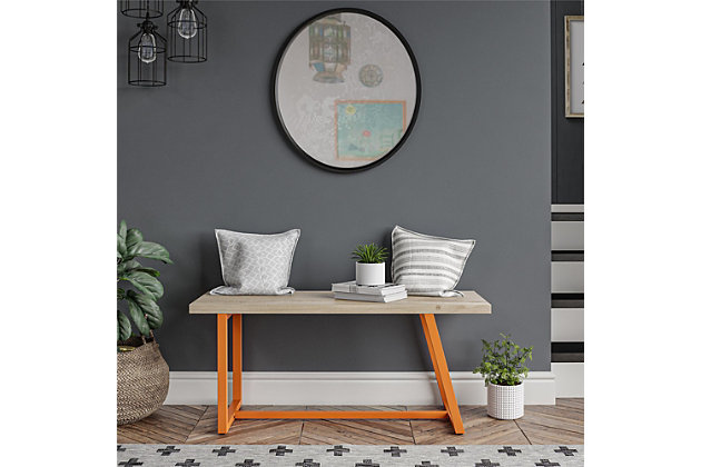 Show off your style right as you walk through the door with the Novogratz Palomino Asymmetrical Bench. The unique asymmetrical metal base features an orange finish that adds a fun pop of color and pairs with the neutral light brown woodgrain finish on the laminated particleboard and hollow core bench seat. The bench can support up to 200 lbs. and gives you a comfortable spot to take off your shoes after a long day. The fun, retro design is perfect for both modern and traditional rooms. The Bench ships flat to your door and requires assembly upon opening. Two adults are recommended to assemble. Once assembled, the Bench measures to be 18.2"H x 41.9"W x 15.47"D.Add a fun, retro twist to your entryway with the novogratz palomino asymmetrical bench | Made of laminated particleboard and hollow core with a sturdy metal base, the orange base adds a fun pop of color and pairs with the light brown woodgrain finish of the bench seat | The bench offers an ideal spot to take your shoes off after a long day | The fun asymmetrical design is perfect for mid-century modern rooms | The bench ships flat to your door and 2 adults are recommended to assemble. The bench can support up to 200 lbs. Assembled dimensions: 18.2"h x 41.9"w x 15.47"d | 1 year limited warranty is included