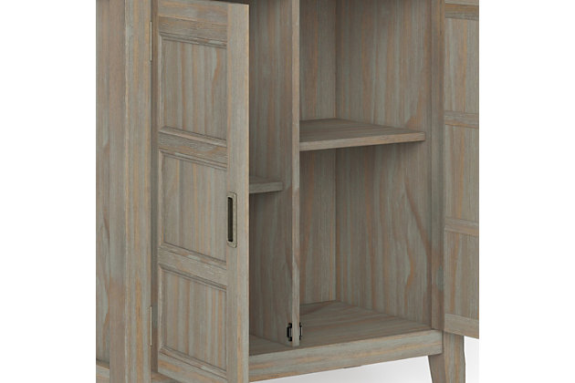 You like to be neat and tidy...that's good, so do we. We designed the Burlington Low Storage Cabinet to organize and enhance the design of your home. Two enclosed adjustable shelves offer the versatility to effortlessly organize and stow away anything you wish. Whether you use it to display your favorite knick knacks or tuck away all those toys, boxes, and extra linens the Burlington Low Storage Cabinet allows you to hide away the clutter behind beautifully designed wood doors. This beautiful and functional piece can be used in any room in your home.; Efforts are made to reproduce accurate colors, variations in color may occur due to computer monitor and photography; At Simpli Home we believe in creating excellent, high quality products made from the finest materials at an affordable price. Every one of our products come with a 1-year warranty and easy returns if you are not satisfiedDIMENSIONS: 14" D x 30" W x 31" H | Handcrafted with care using the finest quality solid wood | Hand-finished with a Farm House Grey stain and a protective NC lacquer coating to accentuate and highlight the grain and the uniqueness of each piece of furniture | Multipurpose cabinet offers plenty of functional storage. Looks great in your living room, entryway, bedroom ,dining room, condo or office | Features 2 panel doors that open to 2 adjustable shelves for versatile storage | Transitional design includes dupont edge top, slightly tapered legs, framed panel doors with antique bronze classic pulls | Assembly Required | We believe in creating excellent, high quality products made from the finest materials at an affordable price. Every one of our products come with a 1-year warranty and easy returns if you are not satisfied.