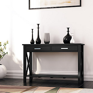 Handcrafted with care using high quality solid pine, this sofa table includes a storage shelf and a large drawer with brushed nickel-tone drawer pulls. Featuring X-shaped legs, smooth squared edges for modern charm and finished with a black stain and protective NC lacquer to highlight the grain, this table exudes rustic charm.Made of pine wood and metal | Handcrafted | Black stain with protective NC lacquer | 2 drawers with brushed nickel-tone hardware | Open lower shelf | Assembly required