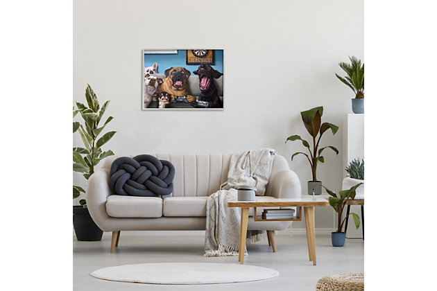 Colorful and comedic, this piece of art showing a handful of hounds playing video games will bring vibrancy to your decor. This giclee print has a texturized brush stroke finish and sits within a ready-to-hang gray frame.Giclee lithograph mounted on wood with a texturized brush stroke finish | Gray frame | Ready to hang | Design by lucia heffernan | Made in usa