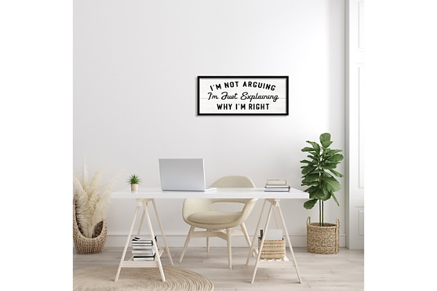 This humorous piece of art's black typography on a white background gives it a neutral appeal that makes it easy to hang anywhere in your home. This giclee print has a texturized brush stroke finish and sits within a ready-to-hang black frame.Giclee lithograph mounted on wood with a texturized brush stroke finish | Black frame | Ready to hang | Design by daphne polselli | Made in usa