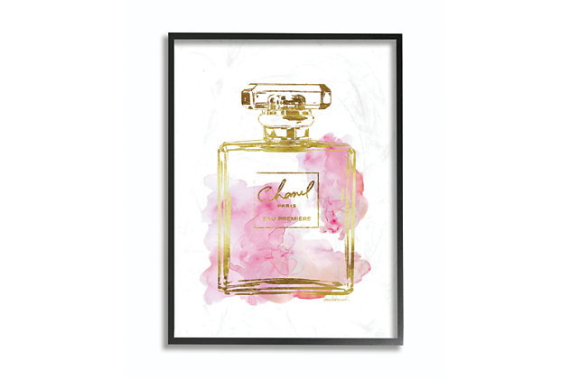 This print of a gold and pink perfume bottle brings notes of glamorous style to your home. This giclee print has a texturized brush stroke finish and sits within a ready-to-hang black frame.Giclee lithograph mounted on wood with a texturized brush stroke finish | Black frame | Ready to hang | Design by amanda greenwood | Made in usa