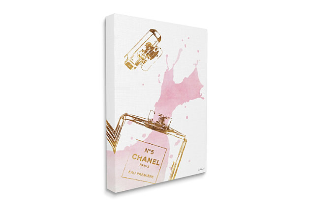This print of a gold and pink perfume bottle brings notes of glamorous style to your home. Printed with high-quality inks and canvas, this piece is hand cut and comes ready to hang.Printed with high-quality inks and hand cut canvas | Wood stretcher bar | Ready to hang | Design by amanda greenwood | Made in usa