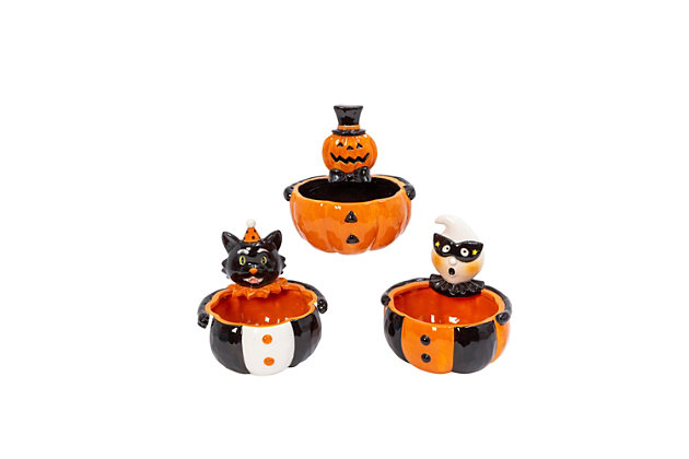 Fill this set of three Halloween cuties with sweet treats of the season. Brightly painted, these three food safe bowls can be placed throughout your home, so whenever you get a sweet tooth, they are right at your fingertips.Set of 3 | Made of dolomite | Multicolored | 1 jack-o'-lantern | 1 black cat | 1 masked ghost | Food safe; do not microwave | No assembly required