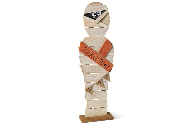 This wooden mummy is an inviting Halloween statue that looks great wherever he is placed. He proclaims, "Trick or Treat" and has a "BOO" banner. This is the perfect decoration to welcome or scare guests as they arrive.Made of pine wood | Handcrafted | Distressed painted finish | No assembly required