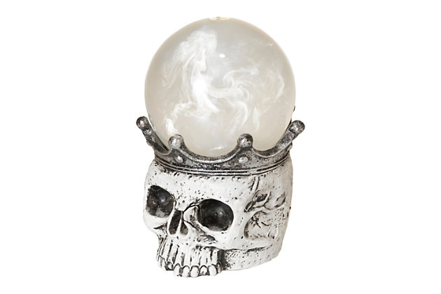 This spooky, attention grabbing skull features a lighted, spinning, smokey water crystal ball resting on his crown is a Halloween masterpiece. Whether you’ve grown to believe a fortune teller’s prediction or you just want to convince your friends and family that you’re in touch with the spirit realm, this battery-powered globe has the perfect mysterious look.Made of plastic, calcium nitrate and water, led lights and polyresin | Multicolored | Timer (6 hours on/18 hours off) | Uses 3 aaa batteries (not included) | No assembly required