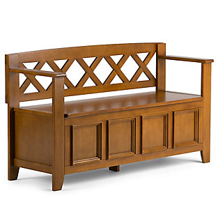 The Amherst storage bench, made from solid wood, allows your inner designer to shine through while creating added storage and seating for your entryway or mudroom. "Form follows function" design rules apply here as the bench features a convenient flip up lid allowing for easy retrieval of articles from the dual storage compartment below.Made of solid wood | Light Avalon brown finish with a protective NC lacquer to accentuate and highlight the wood grain | Lift up lid that opens using safety hinges to expose 2 large internal storage compartments | Library framed square front panels; X-back and side design | Seats 2 comfortably | Assembly required | 1-year warranty