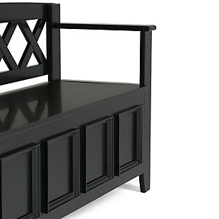 The Amherst storage bench, made from solid wood, allows your inner designer to shine through while creating added storage and seating for your entryway or mudroom. "Form follows function" design rules apply here as the bench features a convenient flip up lid allowing for easy retrieval of articles from the dual storage compartment below.Made of solid wood | Rich black finish with a protective NC lacquer to accentuate and highlight the wood grain | Lift up lid that opens using safety hinges to expose 2 large internal storage compartments | Library framed square front panels; X-back and side design | Seats 2 comfortably | Assembly required | 1-year warranty