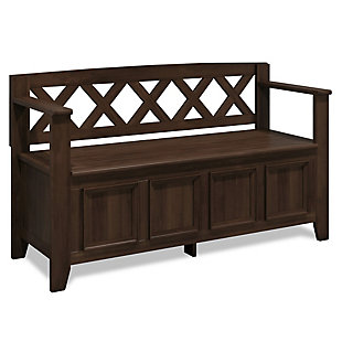 The Amherst storage bench, made from solid wood, allows your inner designer to shine through while creating added storage and seating for your entryway or mudroom. "Form follows function" design rules apply here as the bench features a convenient flip up lid allowing for easy retrieval of articles from the dual storage compartment below.Made of solid wood | Natural aged brown with a protective NC lacquer to accentuate and highlight the wood grain | Lift up bench lid opens using safety hinges to expose 2 large internal storage compartments | Library framed square front panels; X-back and side design | Seats 2 comfortably | Assembly required | 1-year warranty
