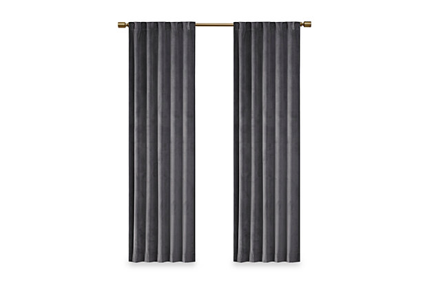 Accentuate your home with the 510 Design Colt Poly Velvet Window Panel Pair. Made from soft solid charcoal poly velvet, these velvet curtain panels exhibit a light sheen and plush texture that soften your décor. The rich, thick velvet fabric creates a room darkening effect and provides extra privacy. A rod pocket top and back tabs make these room darkening curtains easy to hang while also providing a clean tailored look. This window panel is also OEKO-TEX certified, meaning it does not contain any harmful substances or chemicals, ensuring quality comfort and wellness. Machine washable for easy care, this window panel pair add a luxurious touch to your living room or bedroom. Fits up to a 1.25” diameter rod.Imported | Room darkening solid velvet rod pocket/back tab window curtain pair in 3 sizes | Velvet fabric has light sheen and plush texture | Privacy - quality velvet fabric that is not see through | Oeko-tex certified, includes no harmful substances or chemicals (20.hcn.14341) | Panel pair value set ready to decorate | Machine washable for easy care
