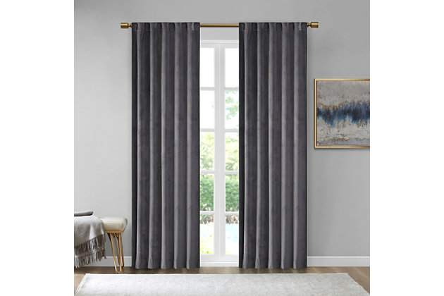 Accentuate your home with the 510 Design Colt Poly Velvet Window Panel Pair. Made from soft solid charcoal poly velvet, these velvet curtain panels exhibit a light sheen and plush texture that soften your décor. The rich, thick velvet fabric creates a room darkening effect and provides extra privacy. A rod pocket top and back tabs make these room darkening curtains easy to hang while also providing a clean tailored look. This window panel is also OEKO-TEX certified, meaning it does not contain any harmful substances or chemicals, ensuring quality comfort and wellness. Machine washable for easy care, this window panel pair add a luxurious touch to your living room or bedroom. Fits up to a 1.25” diameter rod.Imported | Room darkening solid velvet rod pocket/back tab window curtain pair in 3 sizes | Velvet fabric has light sheen and plush texture | Privacy - quality velvet fabric that is not see through | Oeko-tex certified, includes no harmful substances or chemicals (20.hcn.14341) | Panel pair value set ready to decorate | Machine washable for easy care