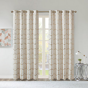 Freshen up your space with the enchanting style of Intelligent Design Raina Window Panel. The stunning panel flaunts a geometric, metallic gold print against a soft ivory ground for a fun and eye-catching look! Finished with a heavy 3 pass foamback liner, this panel is 100% total blackout providing energy efficiency and added privacy. Grommet top makes this panel easy to hang, open, and close through the day. Machine washable for easy care; complete the collection with coordinating bedding and shower curtain sold separately.Imported | Stylish and practical total blackout curtain panel in metallic print | Energy efficient, block noise intrusion and maximum privacy | Feature 3 pass foamback blackout liner to block sunlight and all lights | Silver grommet top that fits up to 1.25 inches rod in diameter | Need to purchase 2 curtain panels for each window | Machine washable for easy care