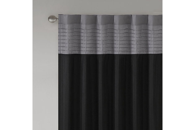 Madison Park Amherst Polyoni Pintuck Window Curtain is a simple way to add style to your room. This window panel features a modern striped design in dark hues of black, charcoal, and silver combined with pintuck detailing for beautiful texture and dimension. The added lining helps filter the perfect amount of light and creates fullness for better drapability. Simply hang using rod pocket or with back tabs for a tailored look. This window curtain fits up to a 1.25" diameter rod.Imported | Transitional pintucking window panel | Back tab or rod pocket to hang | Pieced in colorblock polyoni with pintucking | Lined for more privacy | Light sheen fabric | As shown in image - need to purchase 2 curtain panels for each window for standard coverage | Machine washable