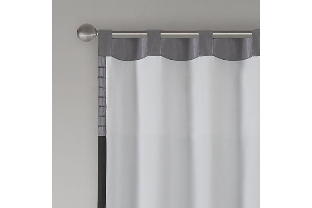 Madison Park Amherst Polyoni Pintuck Window Curtain is a simple way to add style to your room. This window panel features a modern striped design in dark hues of black, charcoal, and silver combined with pintuck detailing for beautiful texture and dimension. The added lining helps filter the perfect amount of light and creates fullness for better drapability. Simply hang using rod pocket or with back tabs for a tailored look. This window curtain fits up to a 1.25" diameter rod.Imported | Transitional pintucking window panel | Back tab or rod pocket to hang | Pieced in colorblock polyoni with pintucking | Lined for more privacy | Light sheen fabric | As shown in image - need to purchase 2 curtain panels for each window for standard coverage | Machine washable