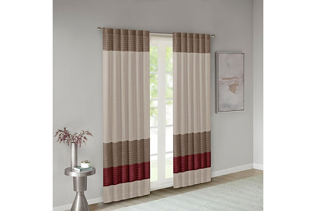 Madison Park Amherst Polyoni Pintuck Window Curtain is a simple way to add style to your room. This window panel features a modern striped design in rich hues of red, tan, and brown combined with pintuck detailing for beautiful texture and dimension. The added lining helps filter the perfect amount of light and creates fullness for better drapability. Simply hang using rod pocket or with back tabs for a tailored look. This window curtain fits up to a 1.25" diameter rod.Imported | Transitional pintucking window panel | Back tab or rod pocket to hang | Pieced in colorblock polyoni with pintucking | Lined for more privacy | Light sheen fabric | As shown in image - need to purchase 2 curtain panels for each window for standard coverage | Machine washable