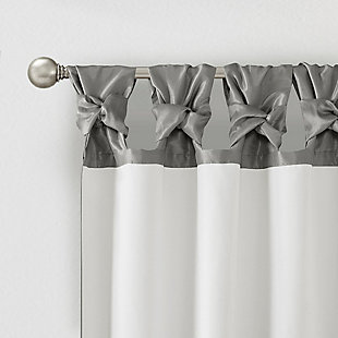 Give your home a decorator’s touch with the Madison Park Emilia Window Curtain. Made from a faux silk fabric, this elegant window curtain features a DIY twist tab top finish that creates rich, deep folds for a professional look. Added lining offers more  privacy and a fuller appearance, while the luxurious sheen and rich charcoal tone provides a touch of sophistication to your décor. Easy to hang, this tab top curtain turns any room into a gorgeous getaway. Hanging instructions are included. Fits up to a 2" diameter rod.Imported | Diy twisted tab top finish window curtain panel | Faux silk sheen base fabric | Added lining for privacy and better drapability | Need to purchase 2 curtains for each window | Machine washable